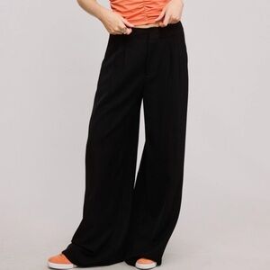748. High rise pleated wide leg trouser in black